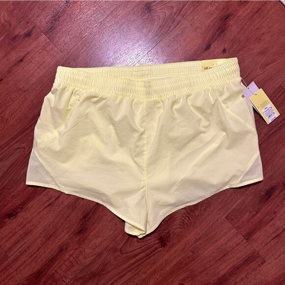 NWT [all in motion] mid rise hilighter yellow run short 3” - Picture 5 of 9